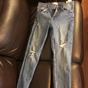 Women’s distressed straight leg jeans